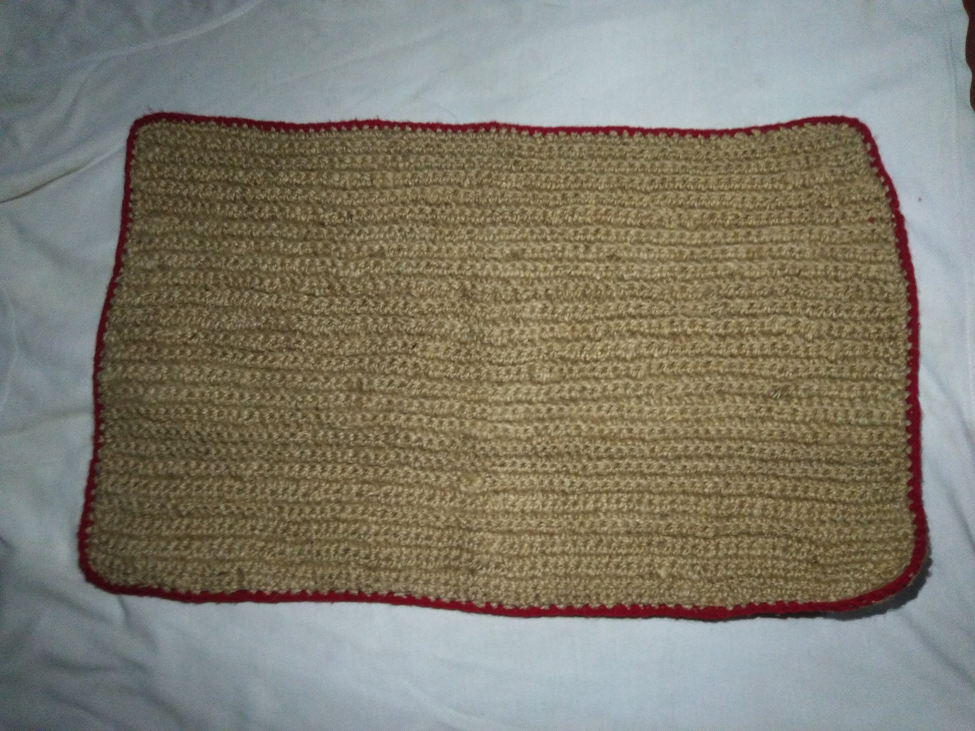 Hand at a loom